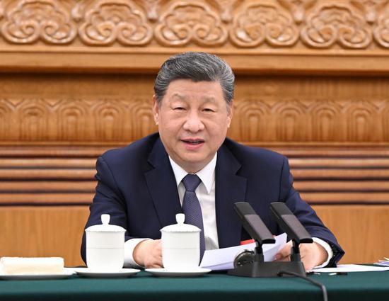 Chinese President Xi Jinping, also general secretary of the Communist Party of China Central Committee and chairman of the Central Military Commission, takes part in a deliberation with his fellow deputies from the delegation of Jiangsu Province at the fourth session of the 14th National People's Congress in Beijing, capital of China, March 5, 2026. (Xinhua/Xie Huanchi)