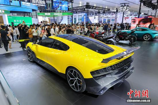 Sports car models make their debut at the 6th China International Consumer Products Expo in Haikou, Hainan Province, April 13, 2026. (Photo: China News Service/Luo Yunfei)