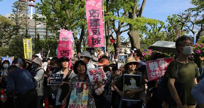 Japanese protesters rally against government's militarization push