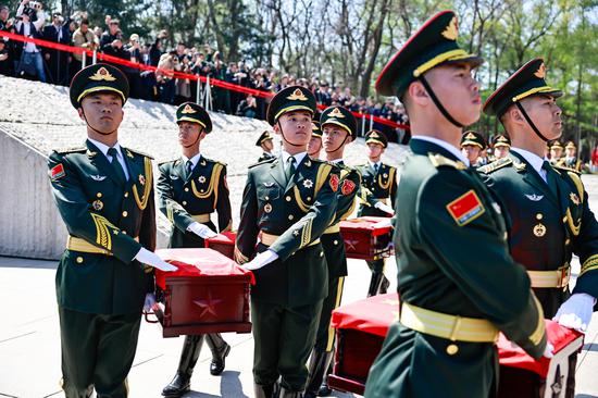 Remains of 12 Chinese martyrs from Korean War buried in homeland