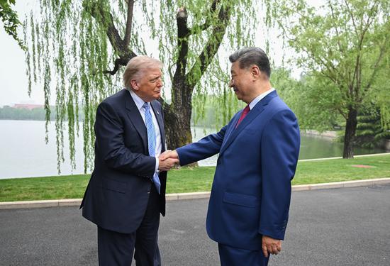 Xi, Trump have private meeting at Zhongnanhai in Beijing