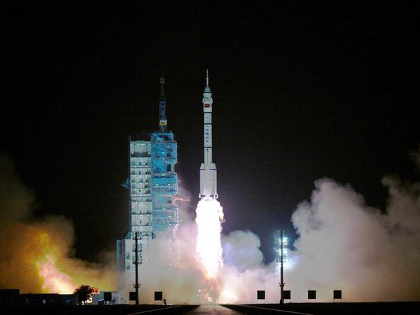 The Shenzhou-23 crewed spaceship, atop a Long March-2F carrier rocket, blasts off from the Jiuquan Satellite Launch Center in northwest China, May 24, 2026. China launched the Shenzhou-23 crewed spaceship on Sunday, which will send three astronauts to its orbiting Tiangong space station. (Xinhua/Lian Zhen)