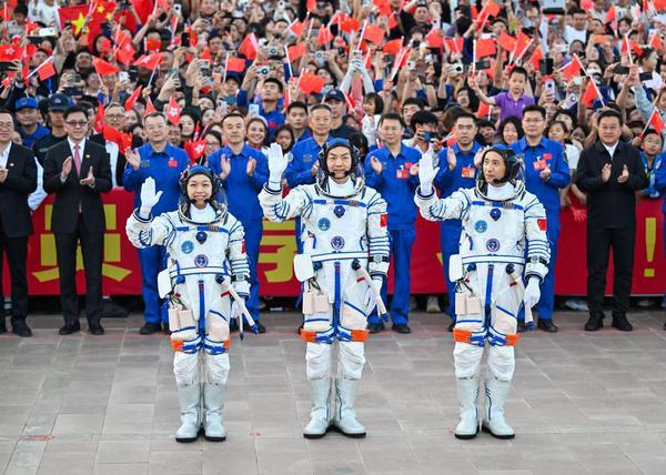 Chinese astronauts Zhu Yangzhu (R), Zhang Zhiyuan (C) and Li Jiaying attend the send-off ceremony at the Jiuquan Satellite Launch Center in northwest China, May 24, 2026. (Xinhua/Li Zhipeng)