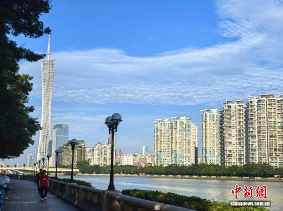 Residential buildings along the river in Guangzhou. (Photo: China News Service/ Xu Qingqing)