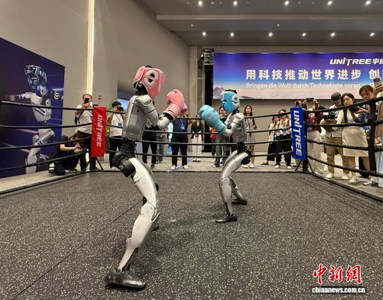 Unitree’s humanoid robot takes part in a boxing demonstration in Hangzhou, Zhejiang Province, June 2. (Photo: China News Service/ Zhang Bin)
