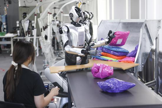 Humanoid robots get 'pre-job training' in Beijing