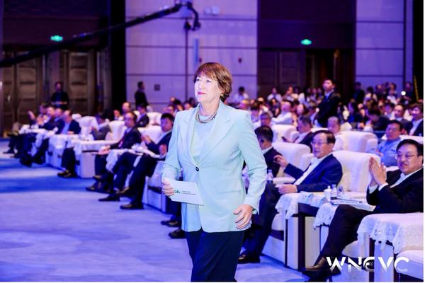 Hildegard Müller, president of the German Association of the Automotive Industry (VDA), walked towards the stage at the 2026 WNEVC.