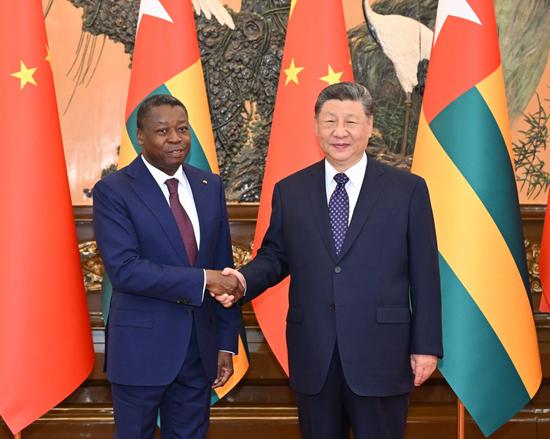 Chinese President Xi Jinping meets with President of the Council of Ministers of Togo Faure Essozimna Gnassingbé, who is on an official visit to China, at the Great Hall of the People in Beijing, capital of China, Oct. 13, 2026. (Xinhua/Li Xiang)