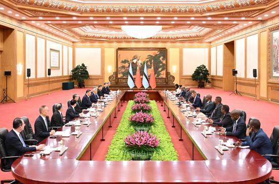 Chinese President Xi Jinping holds talks with Botswana's President Duma Gideon Boko, who is on a state visit to China, at the Great Hall of the People in Beijing, capital of China, Oct. 13, 2026. (Xinhua/Li Xiang)