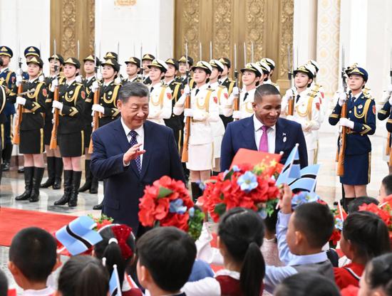 Chinese President Xi Jinping holds a welcome ceremony for Botswana's President Duma Gideon Boko in the Northern Hall of the Great Hall of the People prior to their talks in Beijing, capital of China, Oct. 13, 2026. Xi held talks with Boko, who is on a state visit to China, in Beijing on Tuesday. (Xinhua/Xie Huanchi)