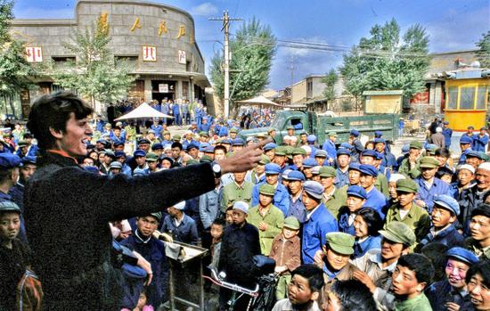 Harold Weldon, aged 19, delivers a speech commemorating the end of the Long March in Wuqi, Shaanxi province, in 1985.