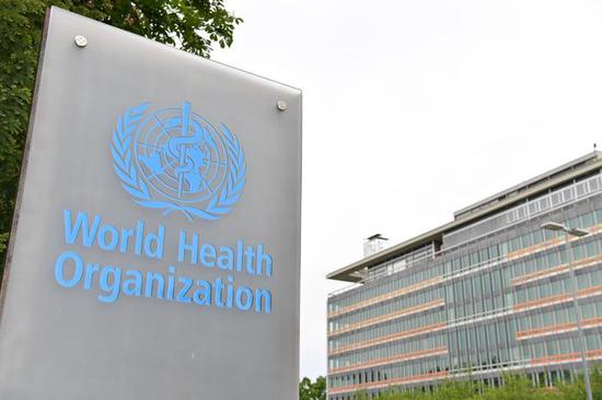 这是2023年5月21日在瑞士日内瓦拍摄的世界卫生组织标志和世卫组织