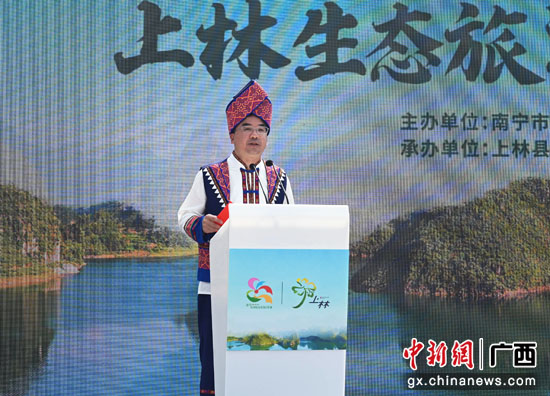 中共上林县委书记梁平江在开幕式上致辞.中新社记者杨志雄 摄