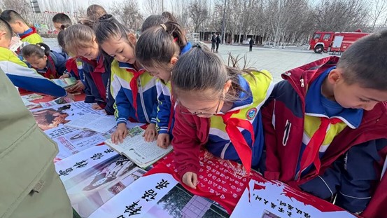 察布查尔县开展“悦读学雷锋·书香润箭乡”主题活动